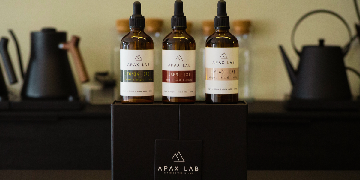 APAX LAB TONIK JAMM and LYLAC mineral concentrate bottles on a café counter